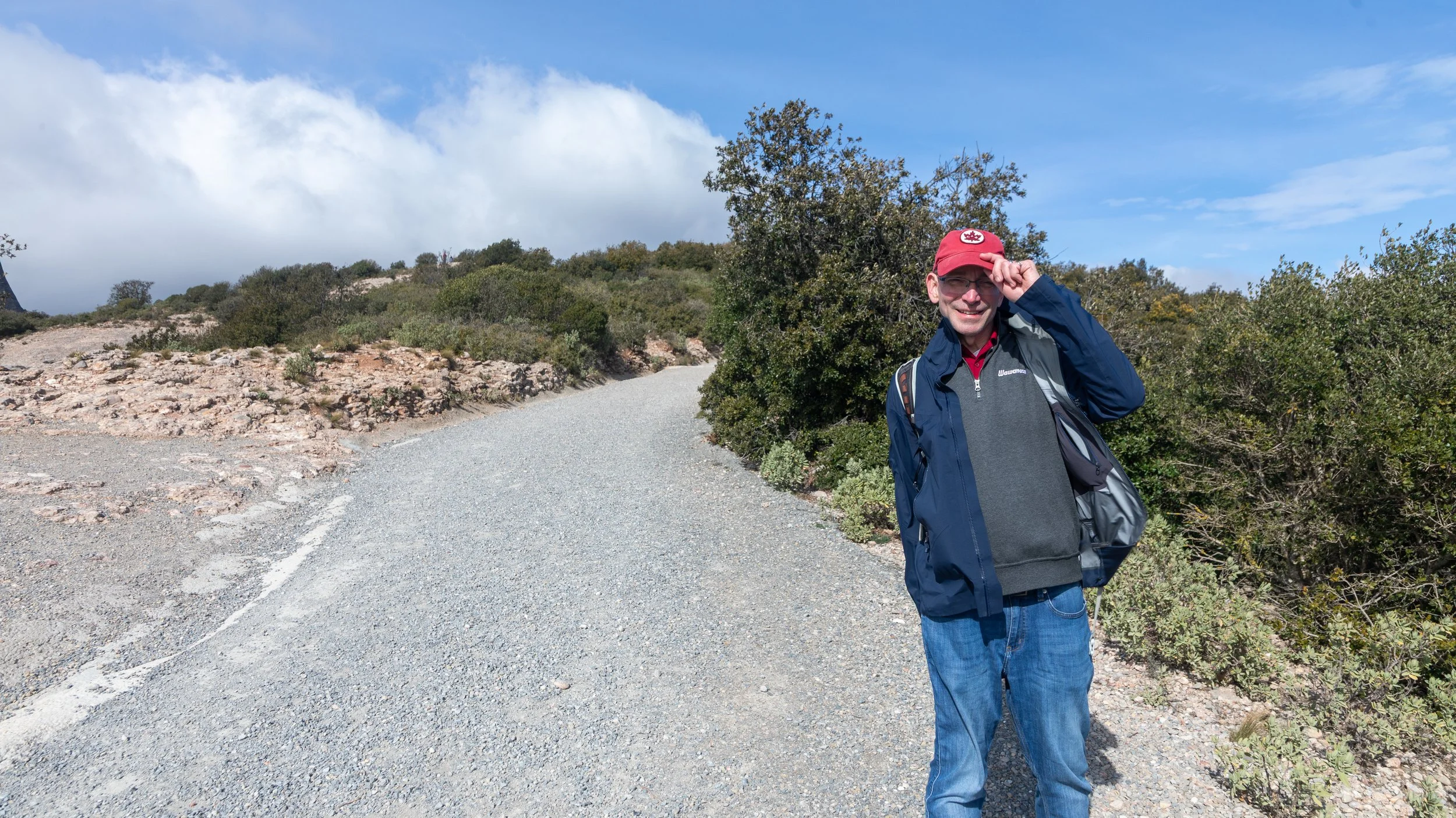  Making our way downhill, the very strong winds make it a challenge to keep my hat on 