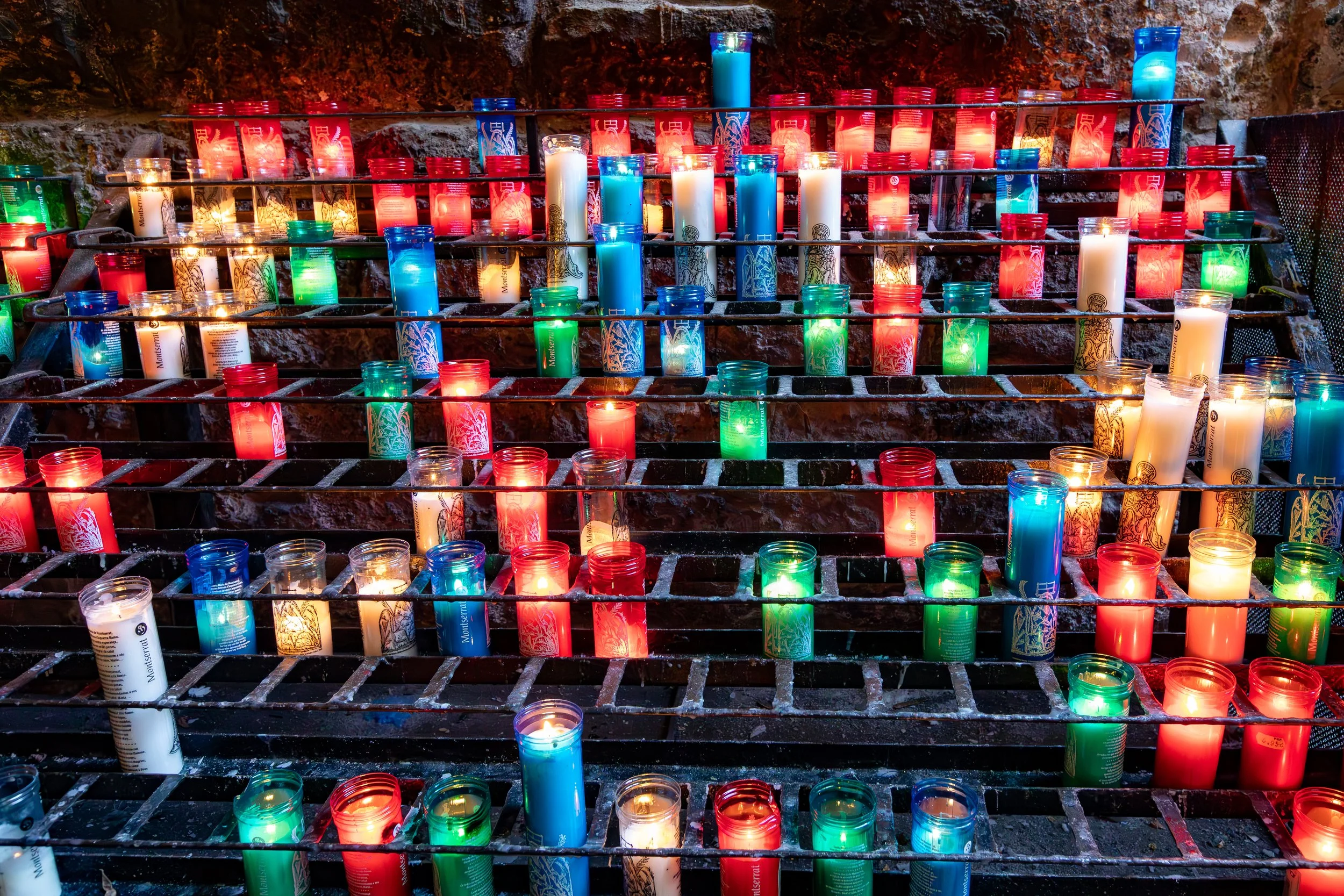  Numerous prayer candles of visitor and pilgrims to the basilica  