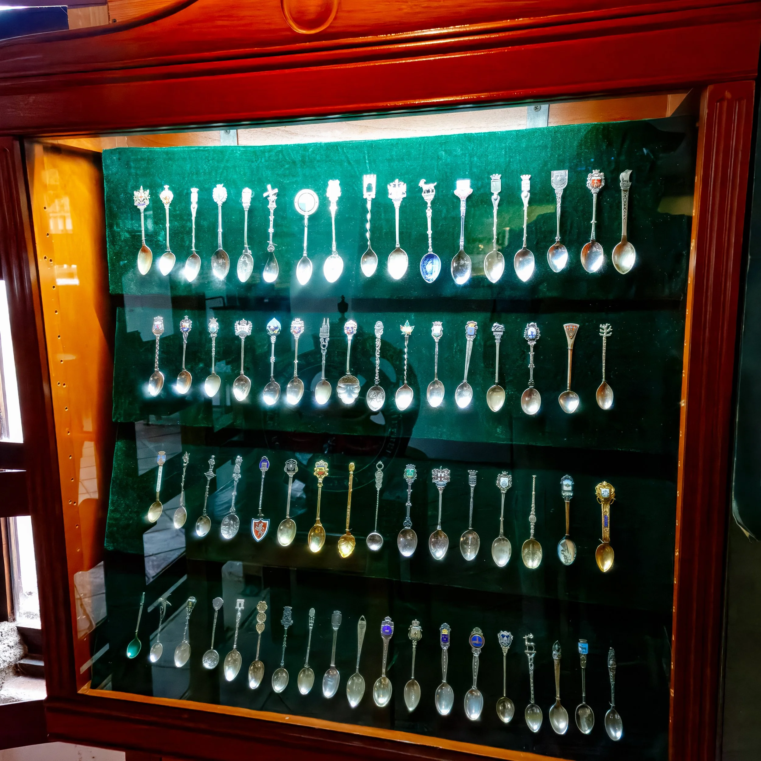  Large collection of spoons to complement a coffee set 