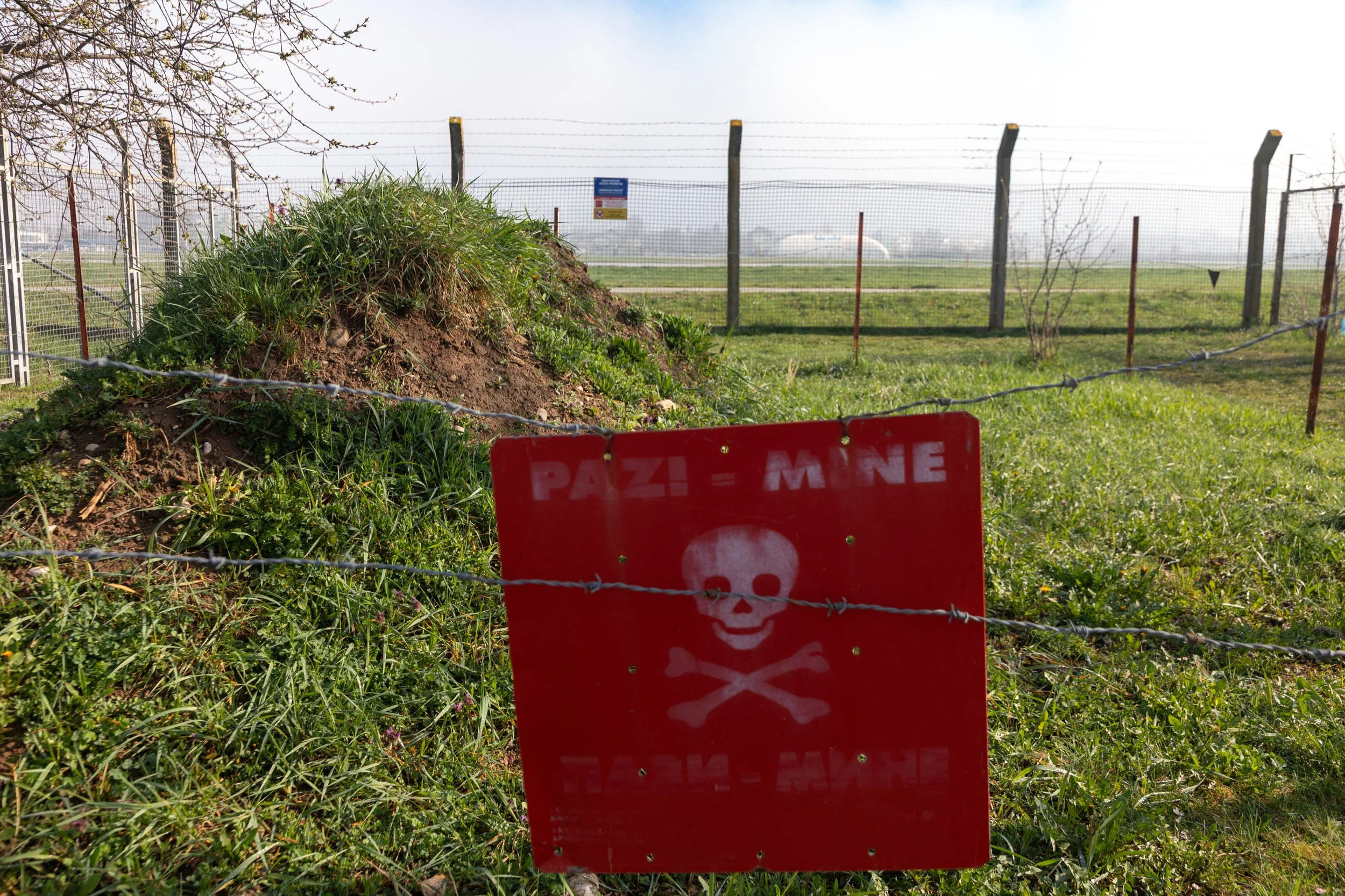  An area near the airport still not fully cleared of the risk of landmines still plaguing the country 