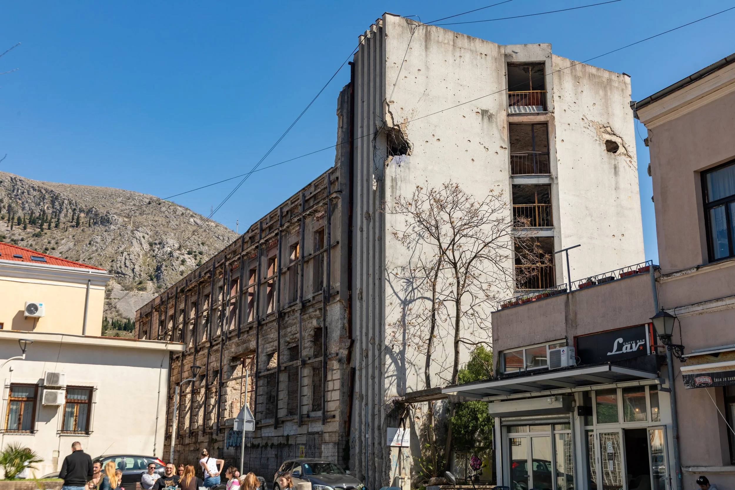  Ruins show significant damage from shell fire during the Yugoslav War, preserved as a reminder of the conflict 