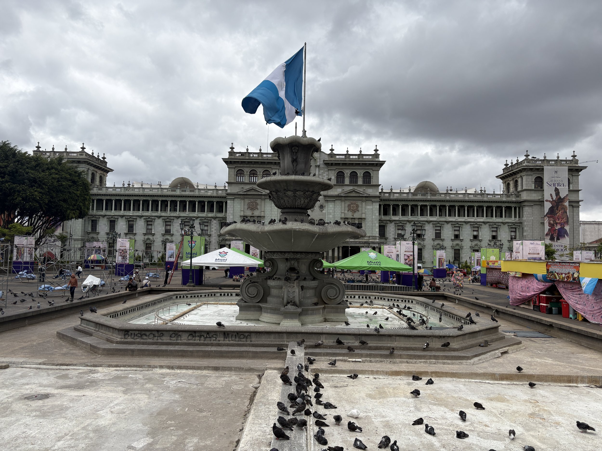  The fountain and flag of Plaza de la Consitucion looking a little gloomy 