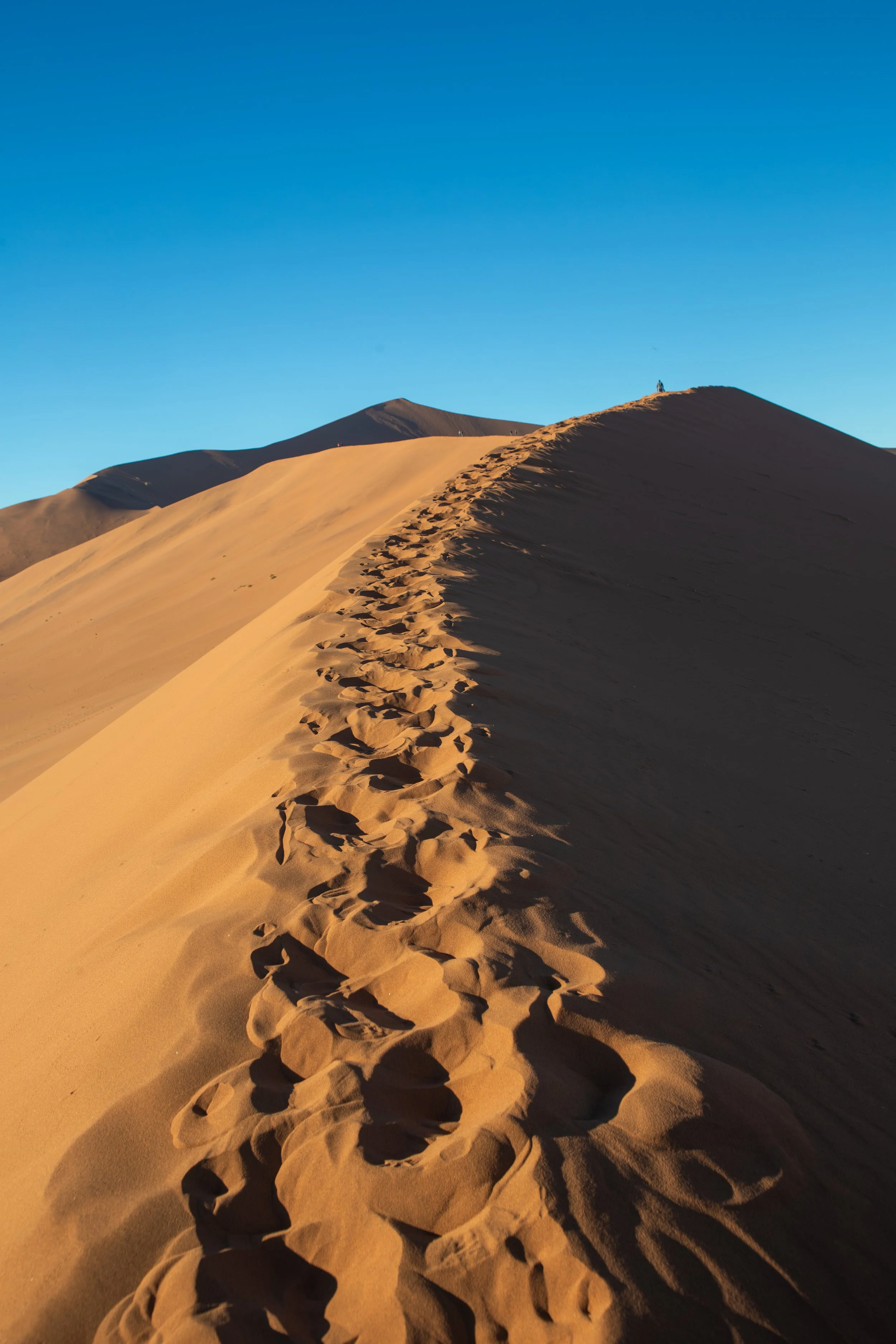  Following the footsteps up Big Daddy is easier than it looks, as long as you don’t mind some sand in your shoes 
