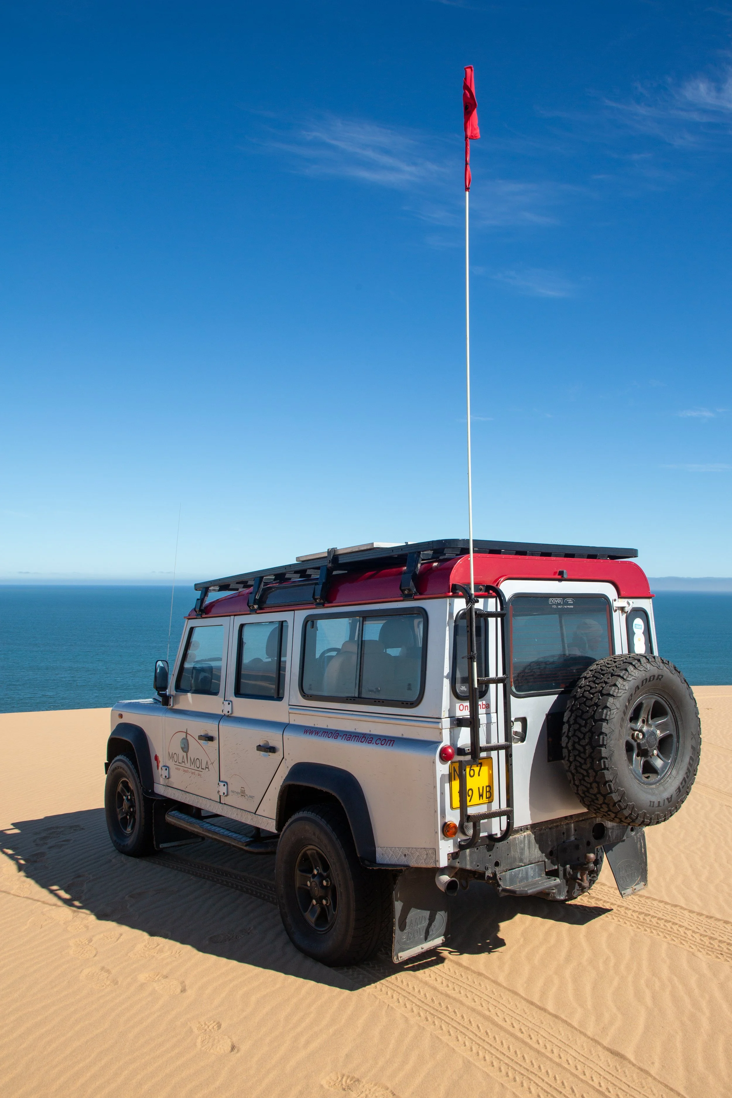  Our tour company uses dune flags to make it easier to see approaching vehicles on the hilly terrain  