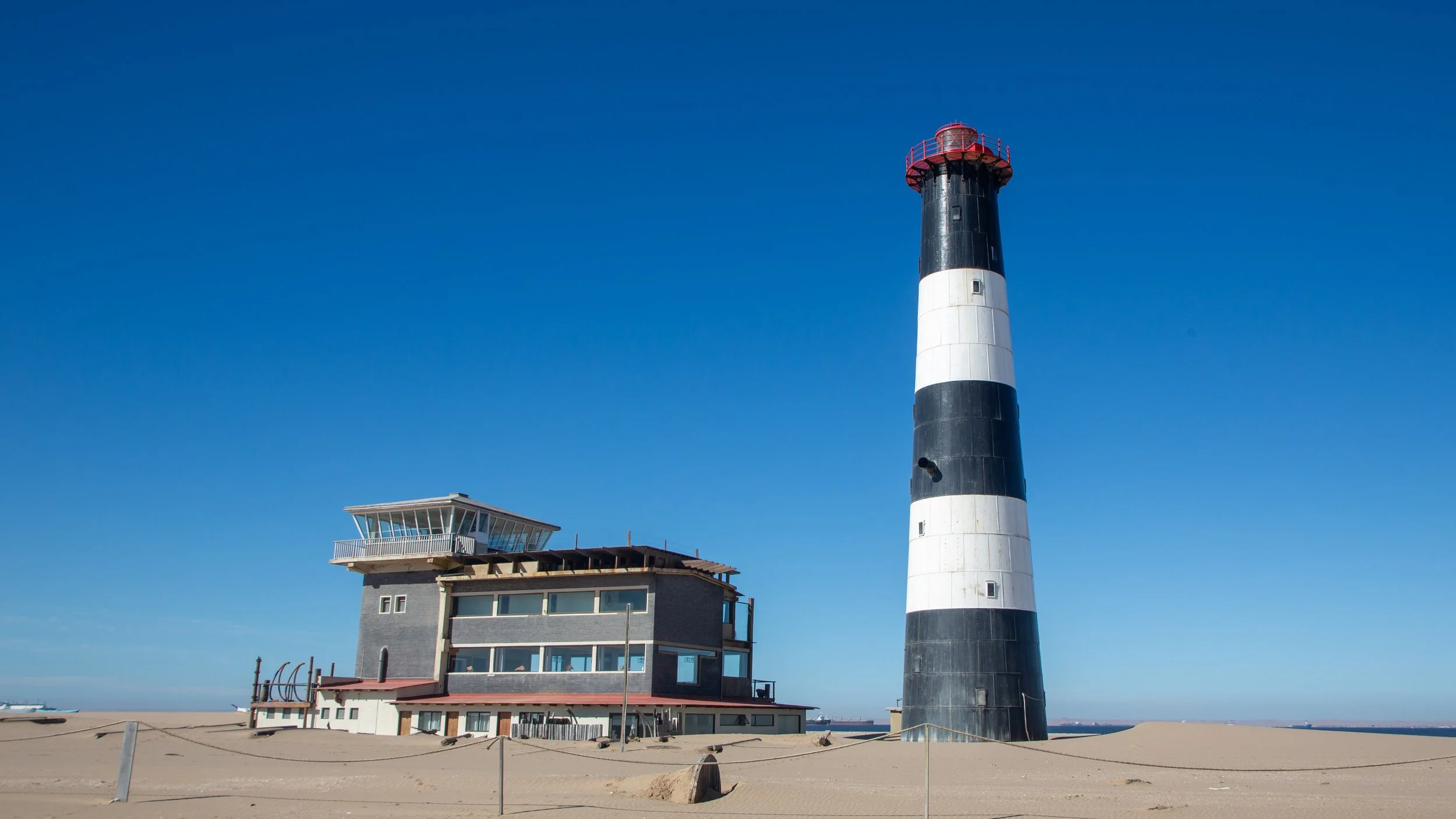  Pelican Point Lighthouse and adjacent hotel 