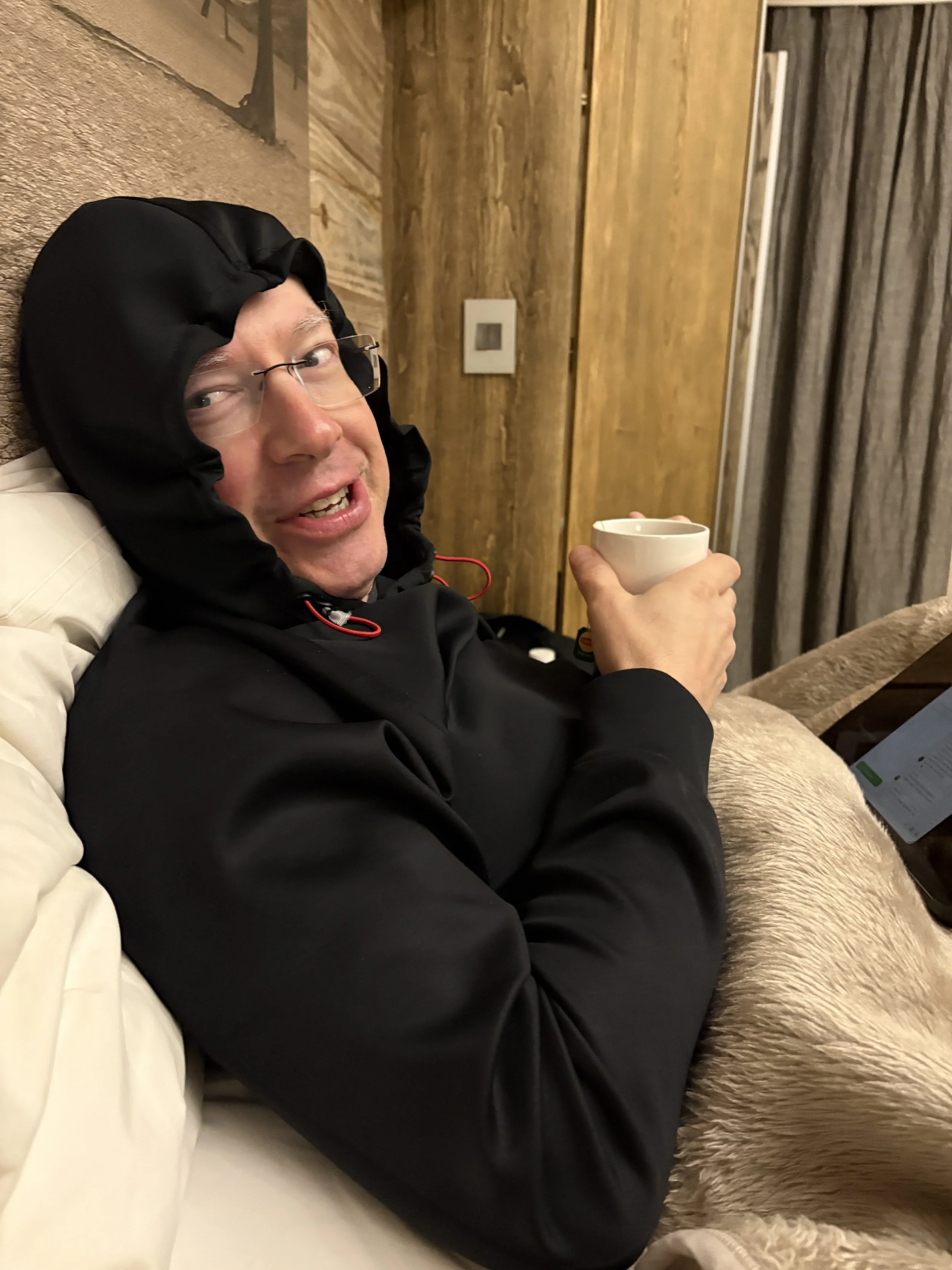 Tom demonstrating just how cold our chalet was in the morning. 