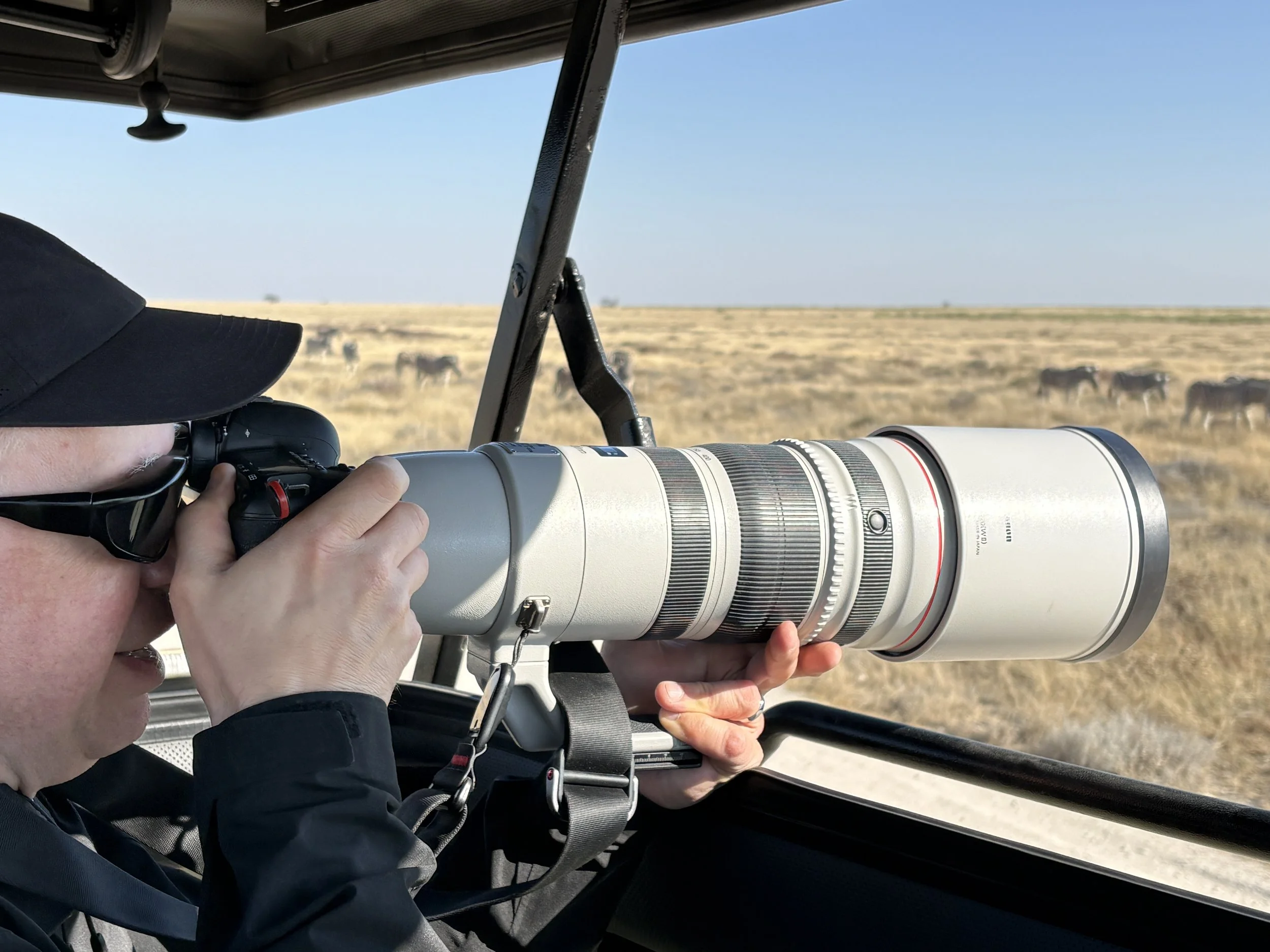  Tom taking advantage of the raisable roof of our safari vehicle 