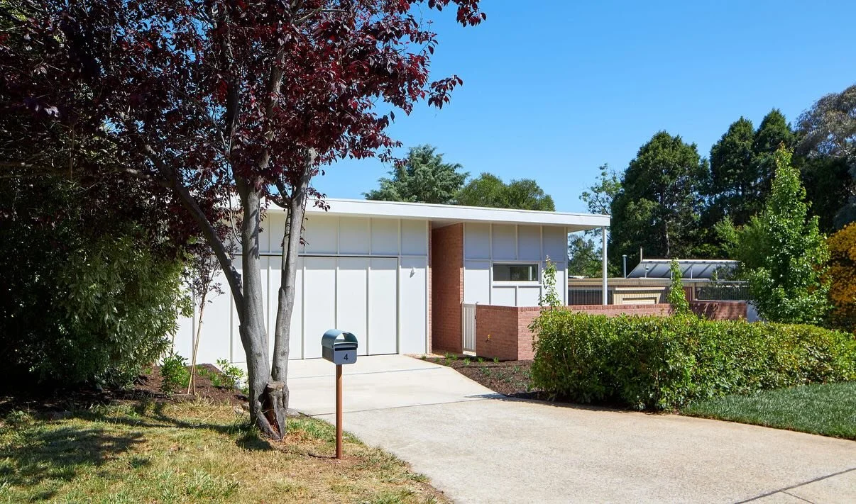 Hughes House // 
This recently completed new home sits quietly on the street under a low-pitch roof. Beyond is a large north facing back yard, flexible living spaces, and sun-filled rooms throughout. Sandstock brick and battened cladding bring this d