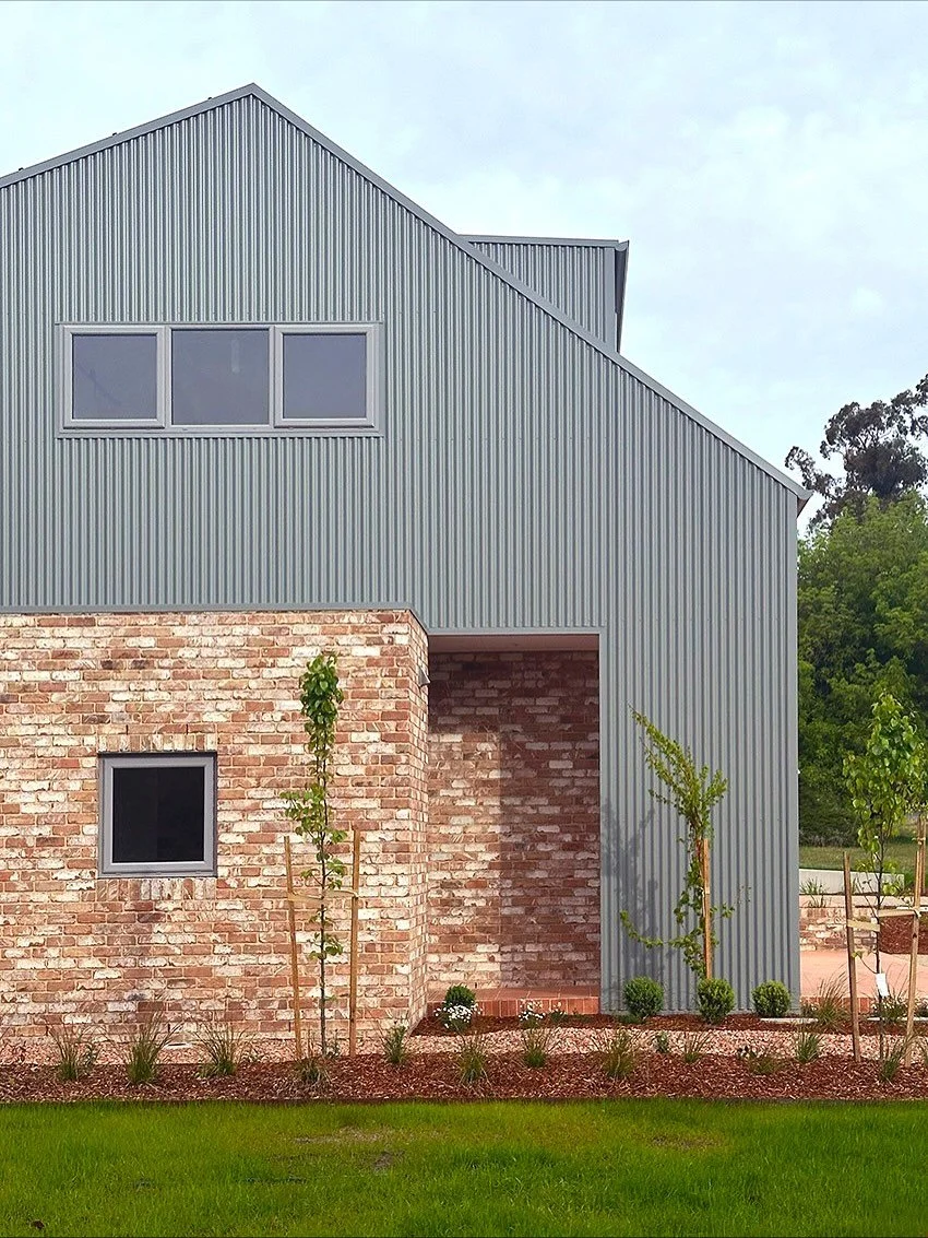 Mawson Dual Occupancy 🏠🏠

Architect &amp; Interior Designer: @de.rome.architects 
Builder: @simmo.arthur 

#architecture #interiordesign #brick #colorbond #corrugated #cbr #duplex