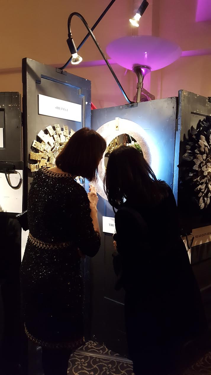 Guests admire The Wiseman Group's wreath