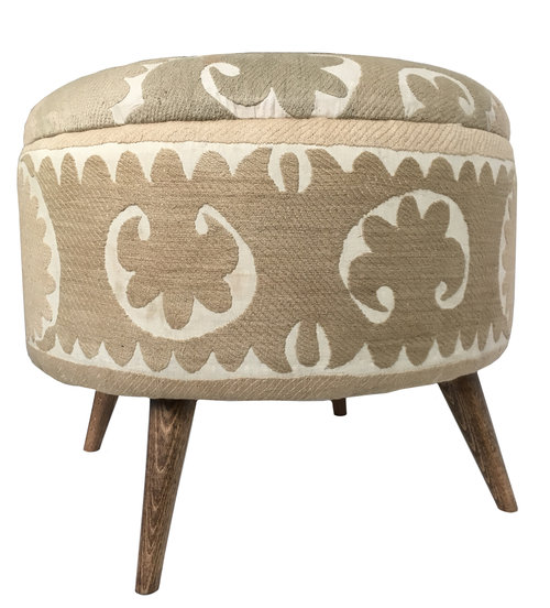 Lotus Bleu repurposed a vintage cotton suzani from Samarkand, by covering an ottoman it for their Istanbul Market Collection