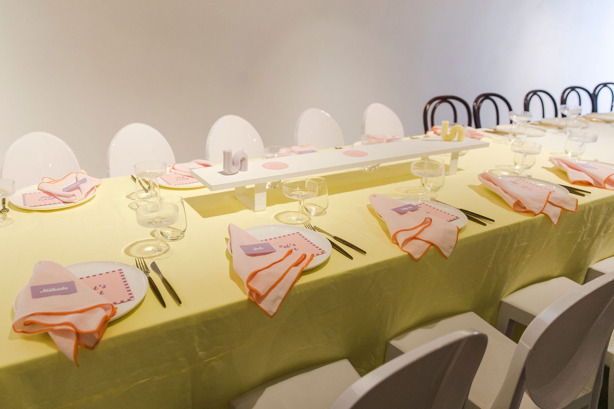 Daffodil Tablecloth with Pink and Orange Contrast Hem Napkins