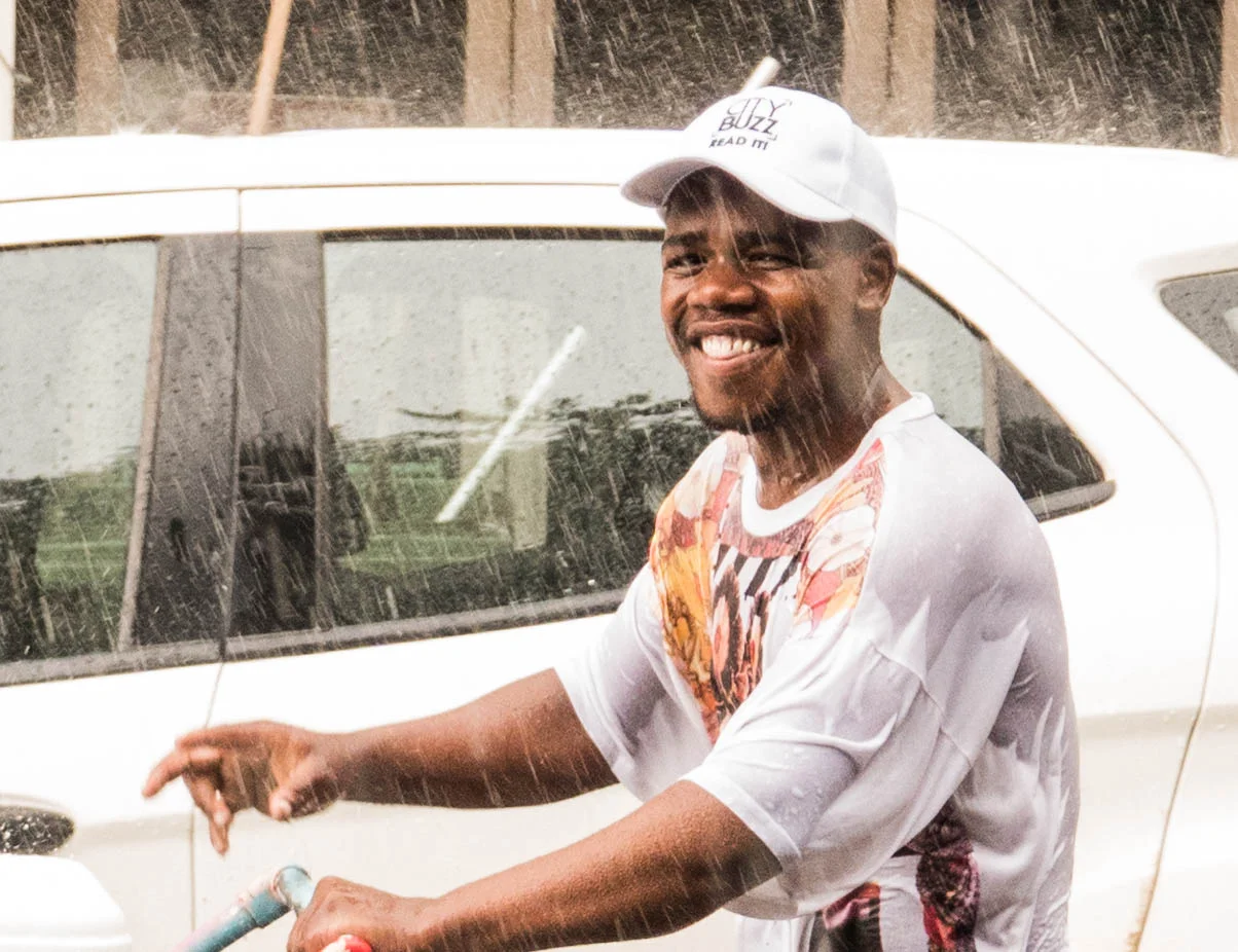 johannesburg-9274February 25, 2018RAIN JOBURG CART DUDE smile closeup 2.jpg