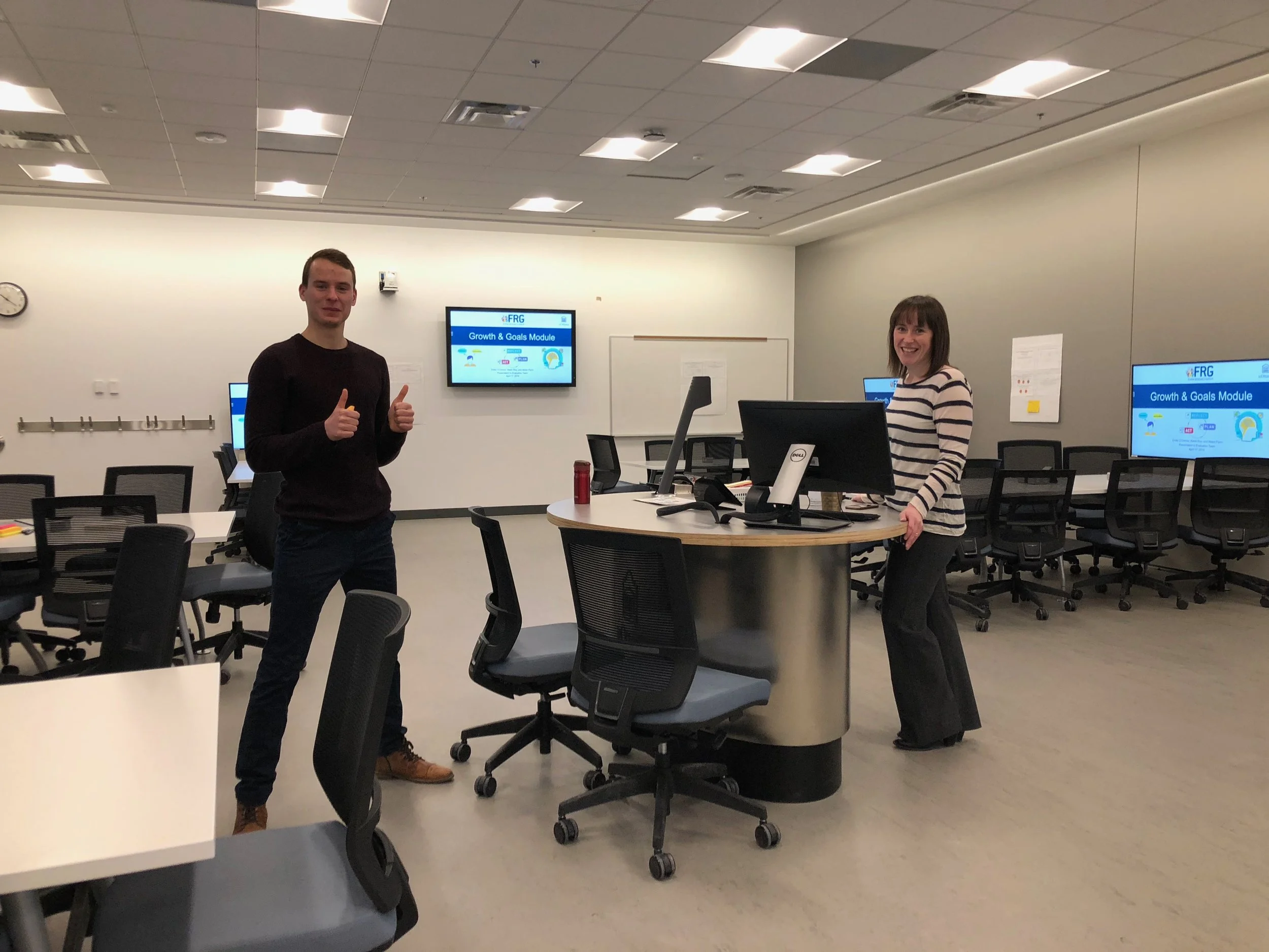 Student leads Kevin Roy and Emily O’Connor preparing for the meeting