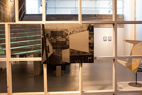 Jonathan Runcio, foreground; Amy M. Ho, staircase