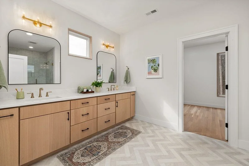 Primary Bathroom Custom Cabinets Mixed Metals.jpg