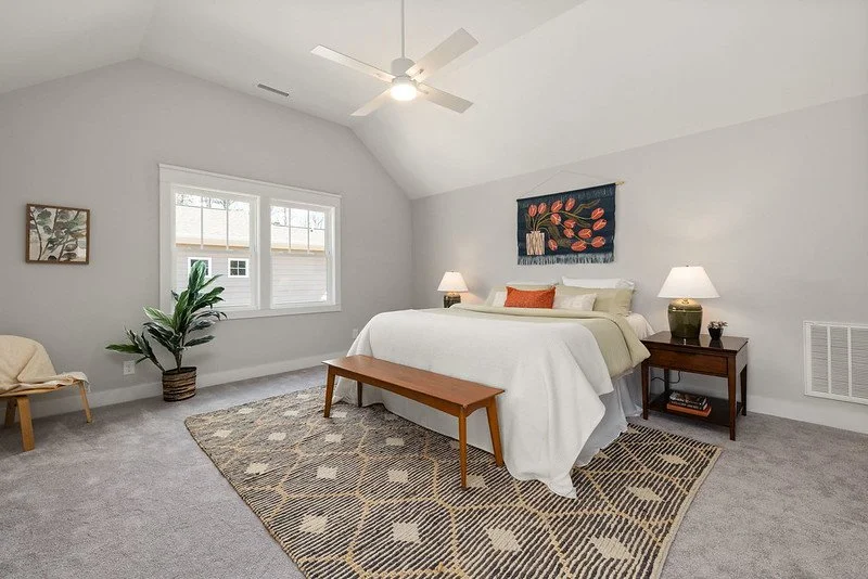 15 Primary Bedroom Spacious Cathedral Ceilings.jpg