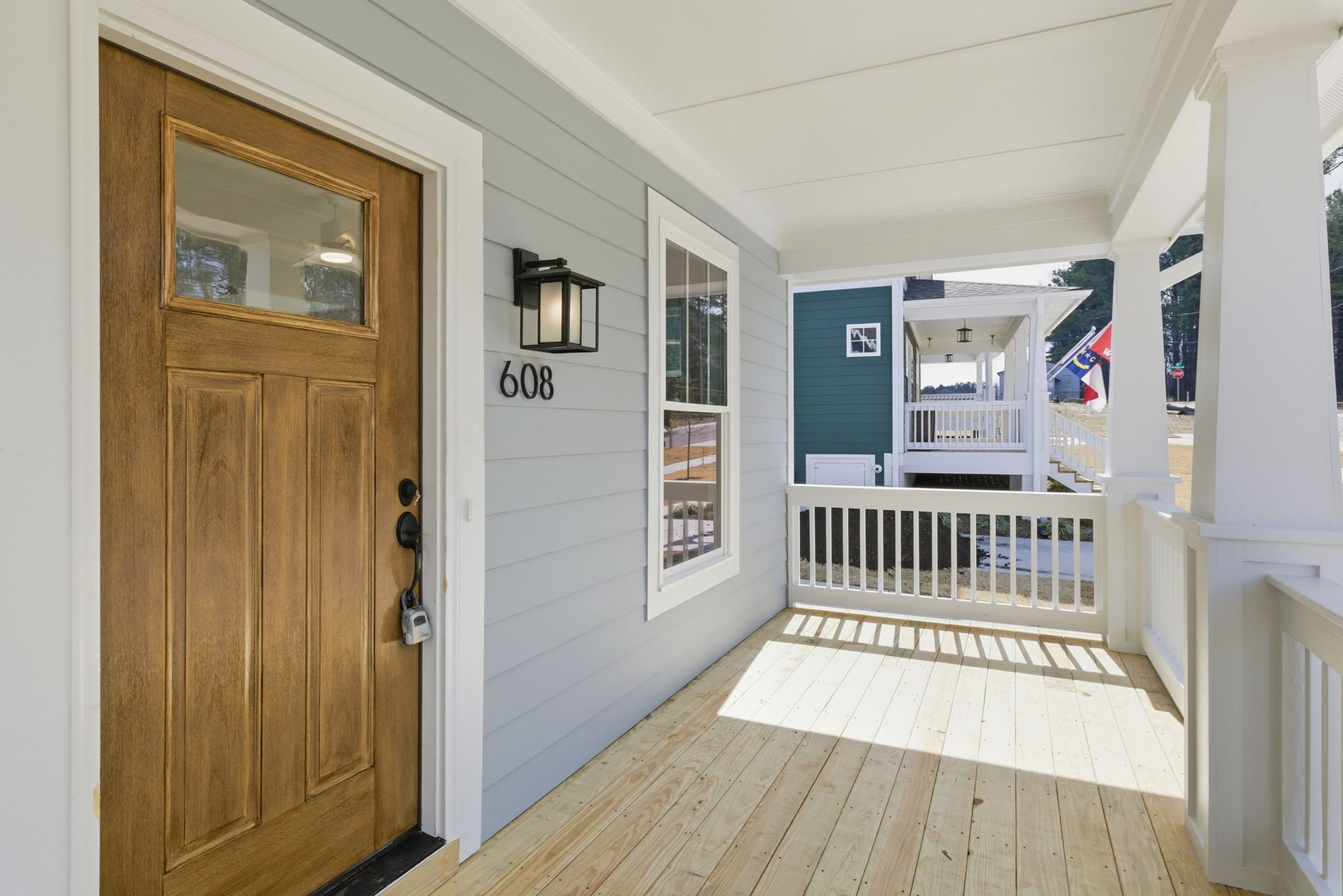 2 New Construction Mid 400s Large Front Porch.jpg