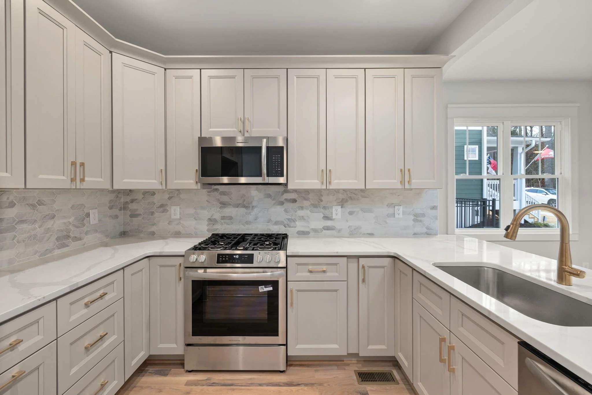 7 Kitchen New Construction Under 500k High End Finishes.jpg