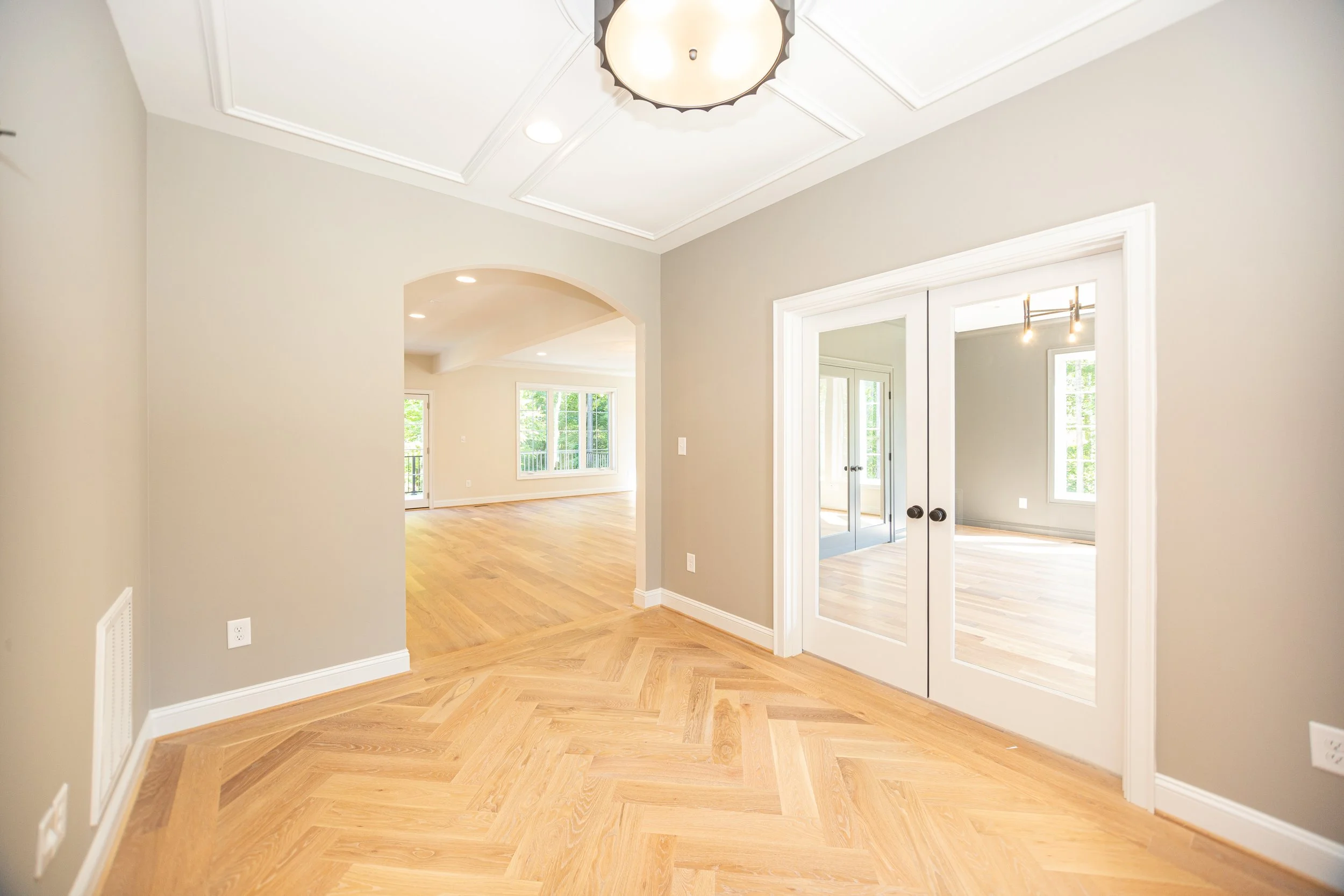 kensington-ii-presale-foyer-herringbone-floors-durham-nc.jpg