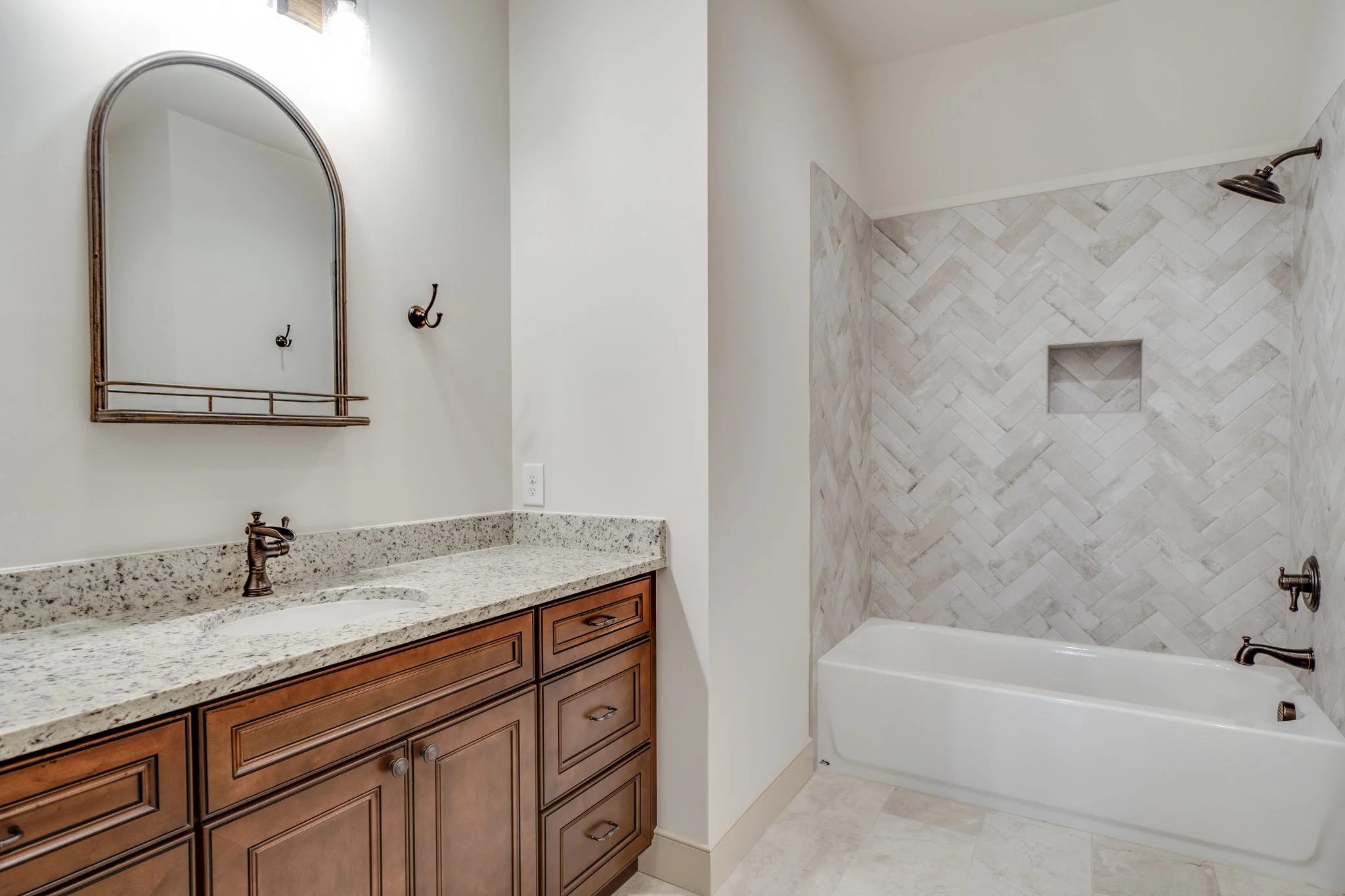 kensington-i-presale-bathroom-herringbone-tile-durham-nc.jpg