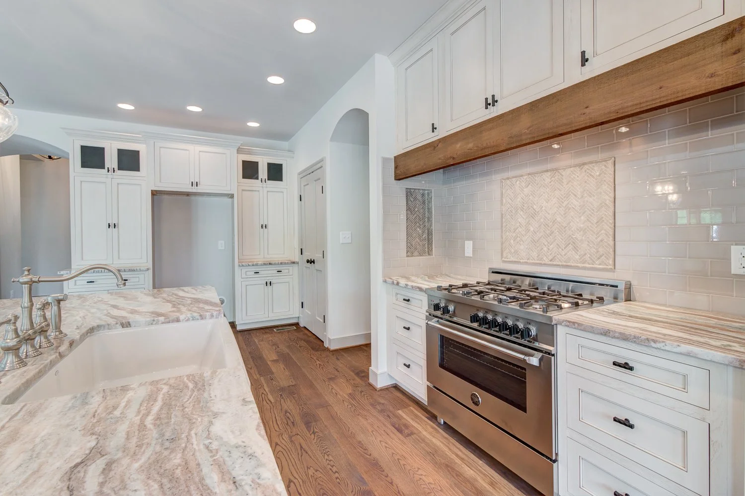 nottingham-i-presale-kitchen-veined-granite-range-hood-durham-nc.jpg