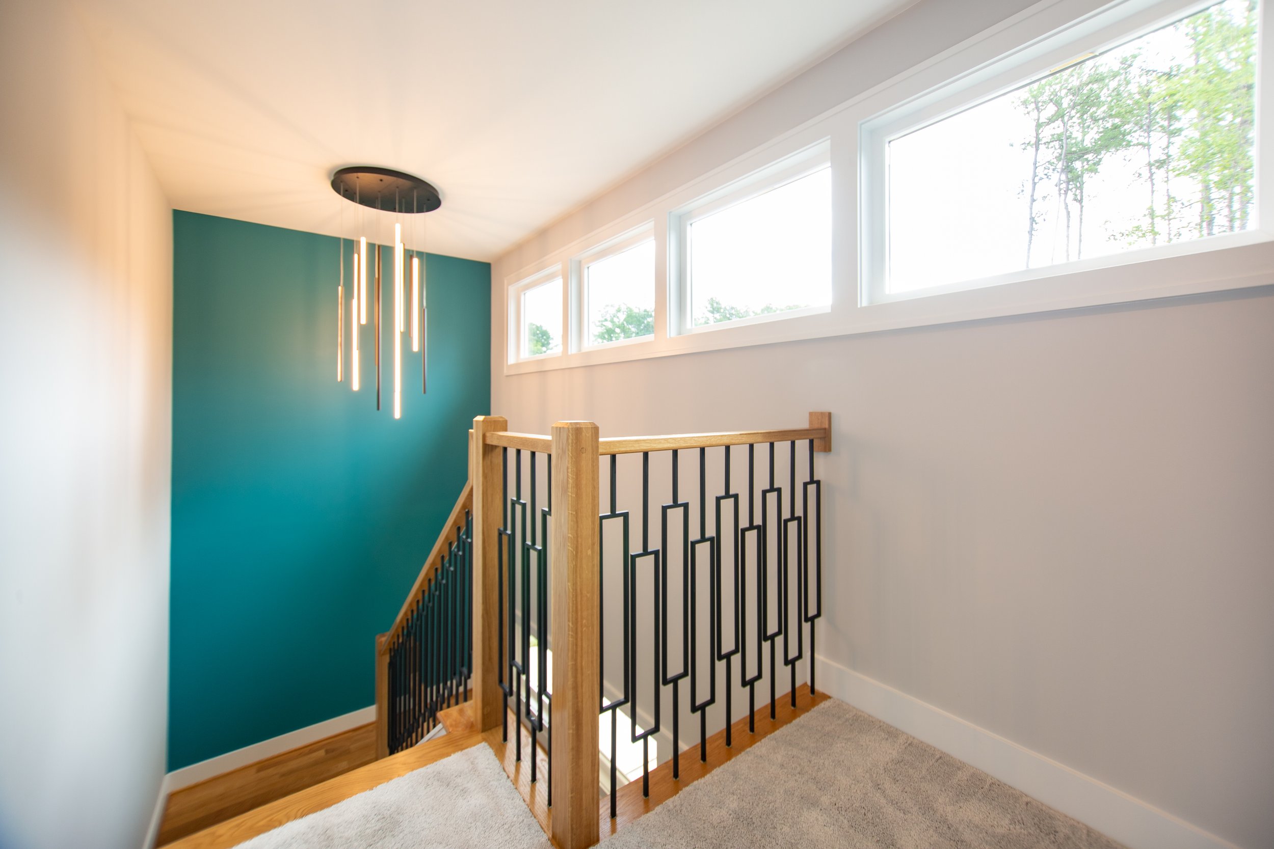 grayson-i-presale-staircase-geometric-railing-on-trend-lighting-durham-nc.jpg