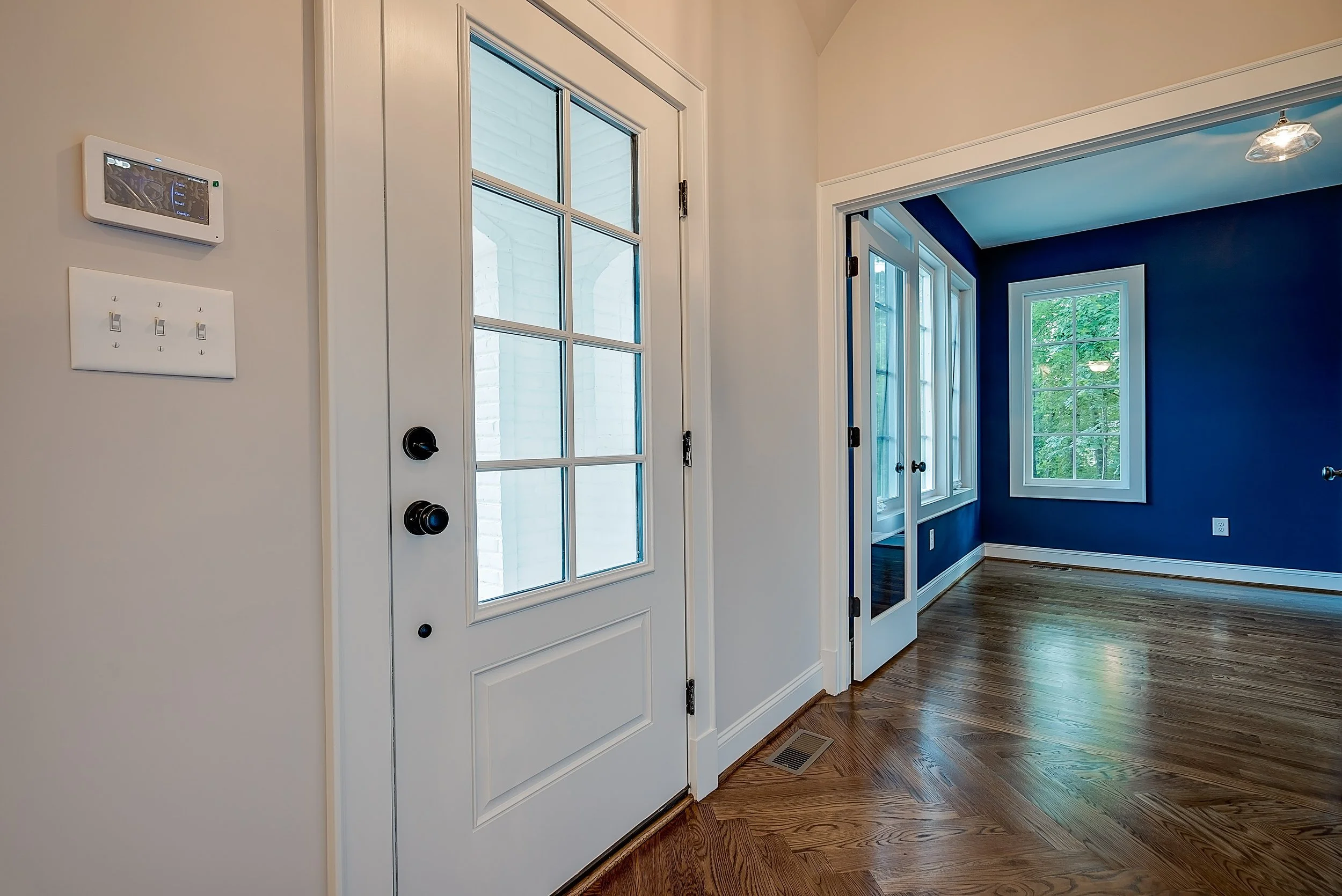 potter-presale-foyer-herringbone-site-built-white-oak-hardwoods-anderson-st-durham.jpg