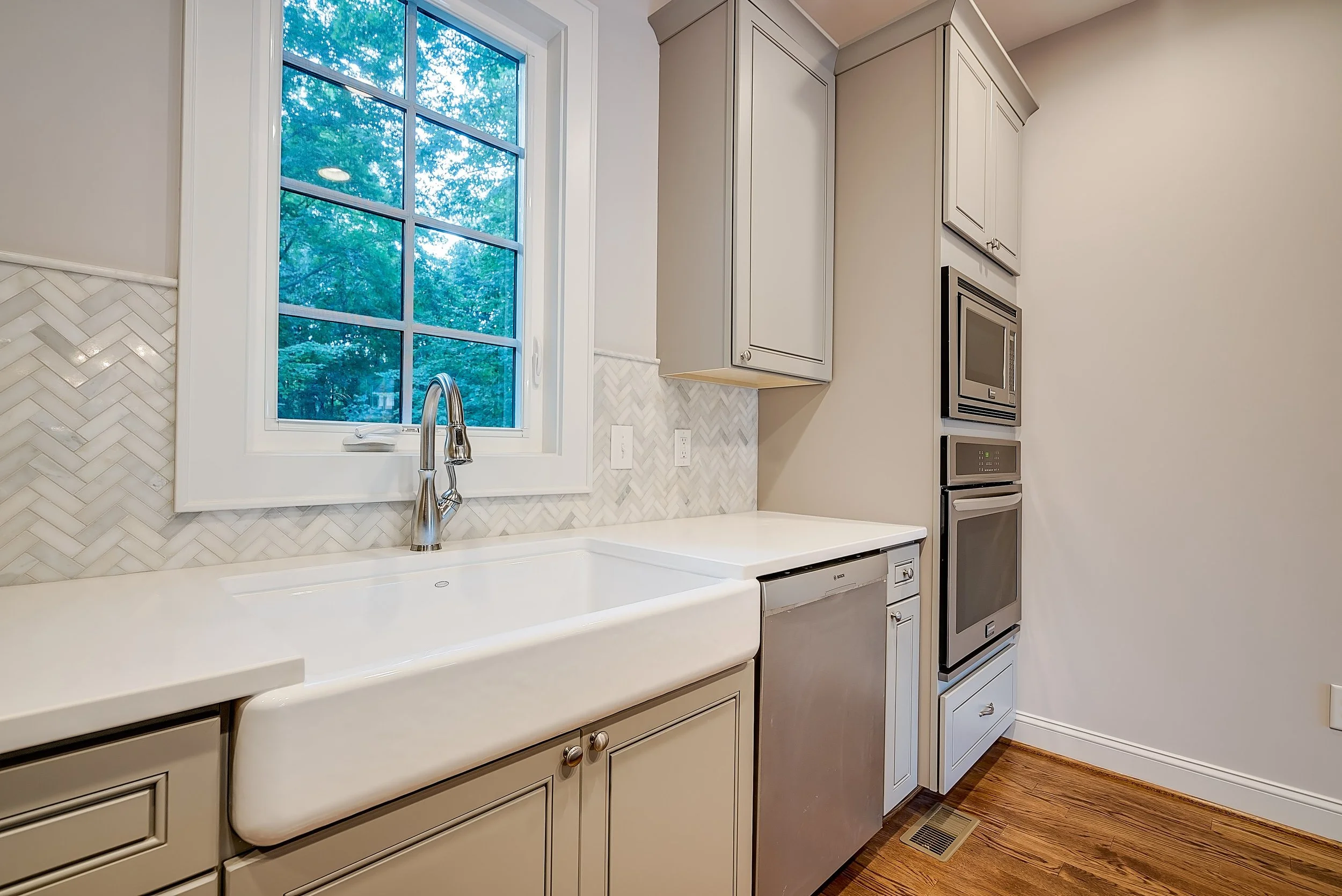 potter-presale-kitchen-apron-sink-herringbone-designer-tile-durham-nc.jpg