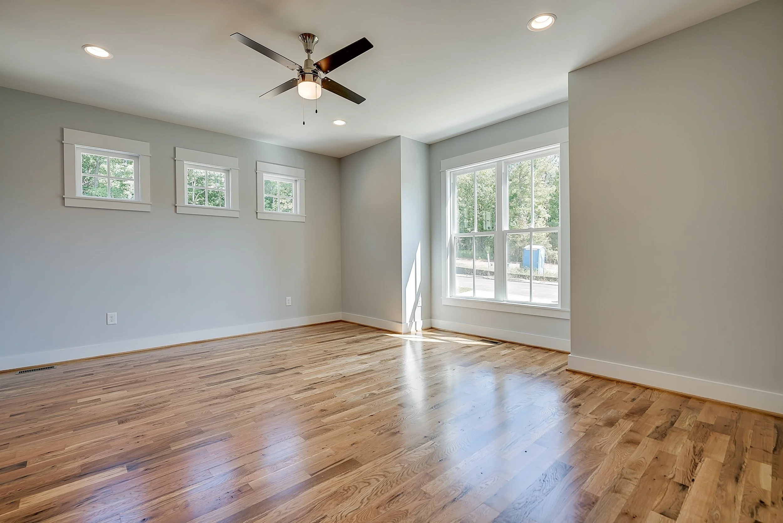 omstead-ii-craftsman-living-room-open-concept-natural-light-durham-nc.jpg