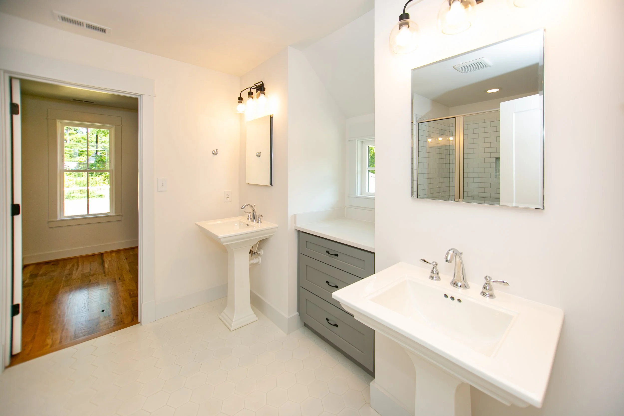 omstead-ii-presale-dual-pedestal-bathroom-hex-tile-durham-nc-27707.jpg