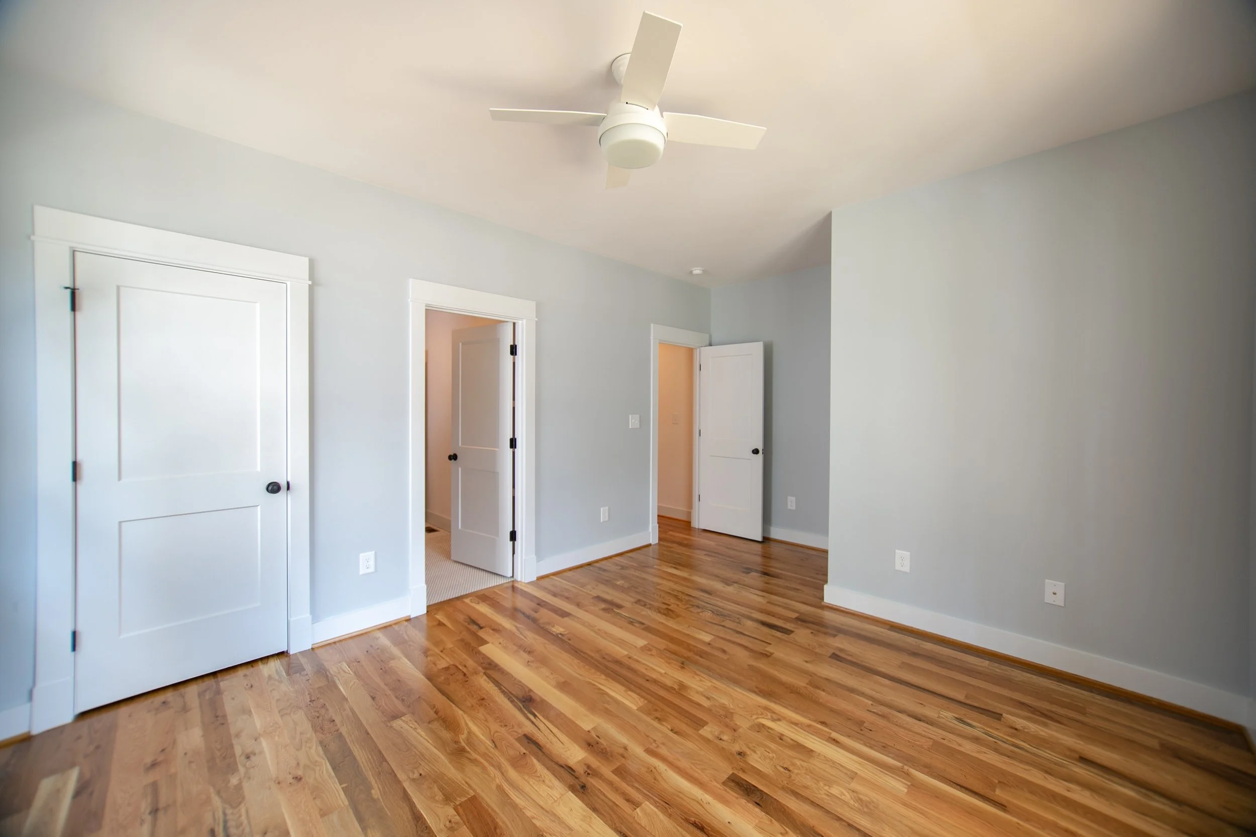 omstead-ii-presale-first-floor-bedroom-suite-white-oak-hardwoods-durham-nc.jpg