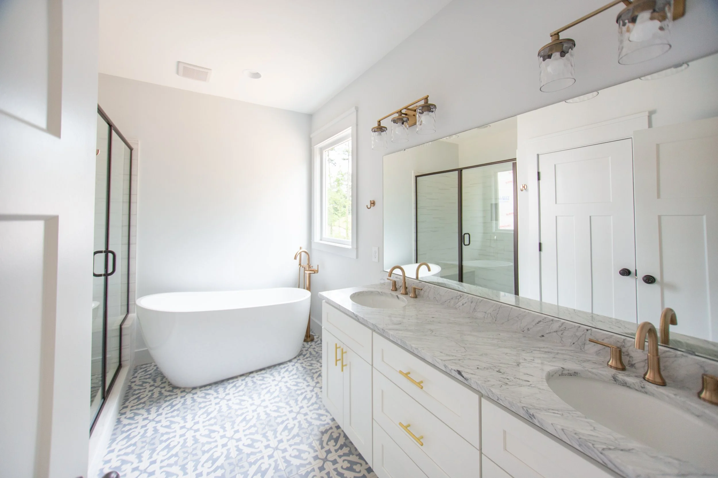 sterling-craftsman-presale-primary-bath-soaking-tub-designer-tile-durham-nc.jpg
