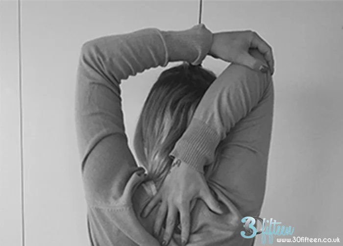 Shoulder and tricep stretch daily 30Fifteen.jpg