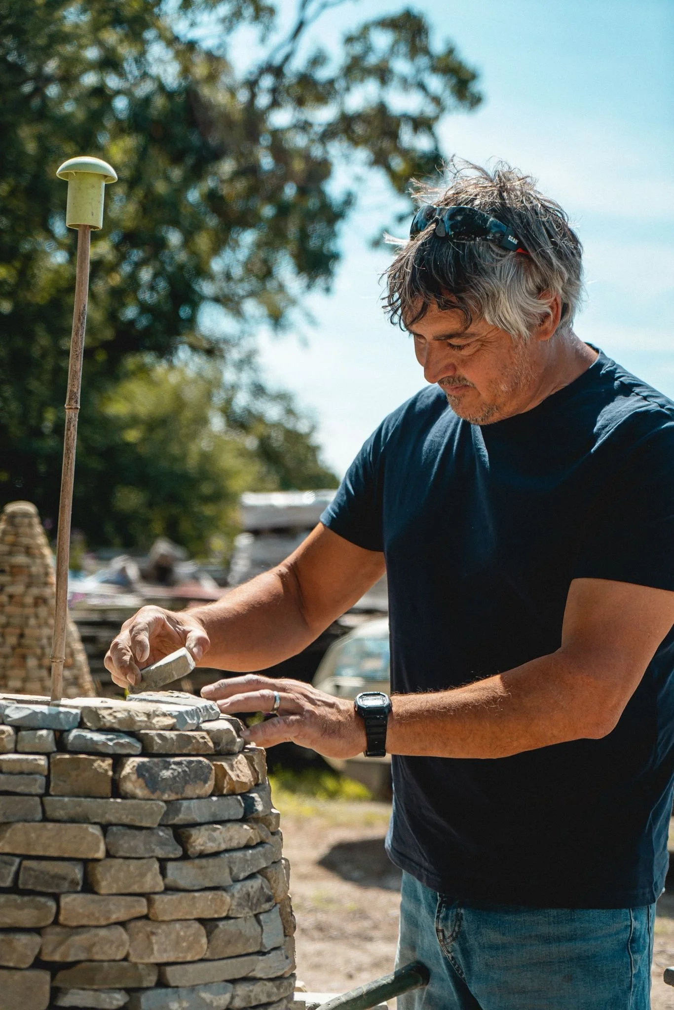 Paul Kendall building a sculpture