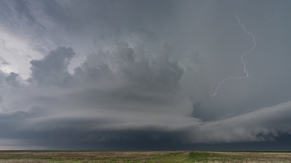 Supercell with lightning bolt and huge inflow tail, Texas.