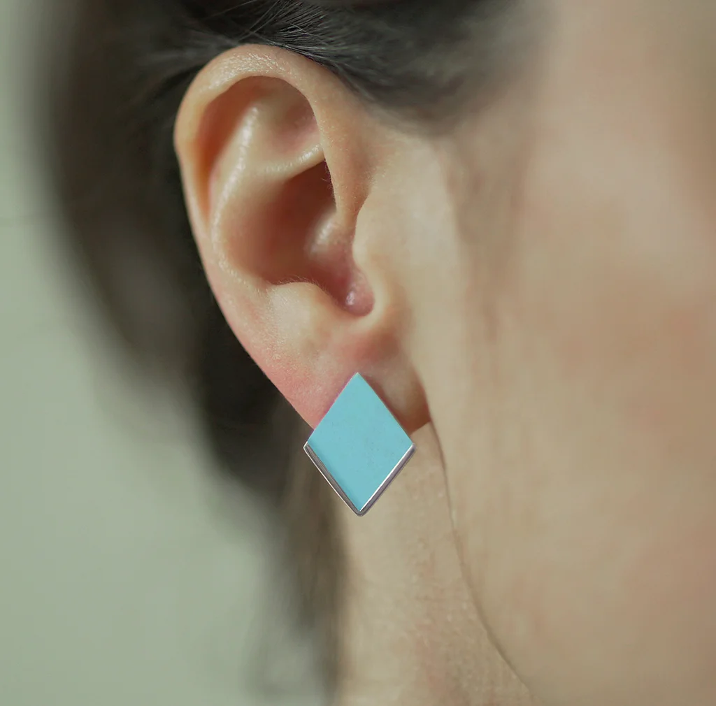 Model wears Riviera Blue Diamond Shaped Studs