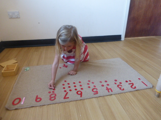 BT girl counting on floor.JPG