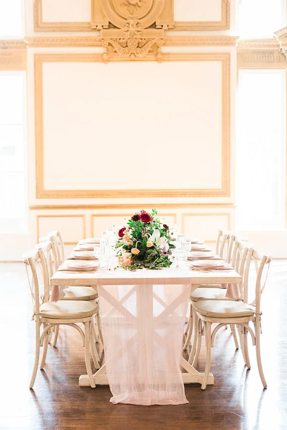 Simple and sweet gauze table runner that you can find here. 