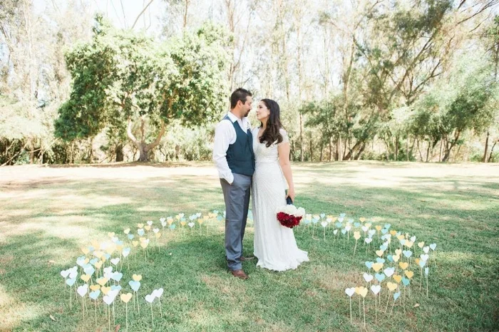 While used here for a photo opp, we love the concept of placing these down the aisle. These can be found here. 