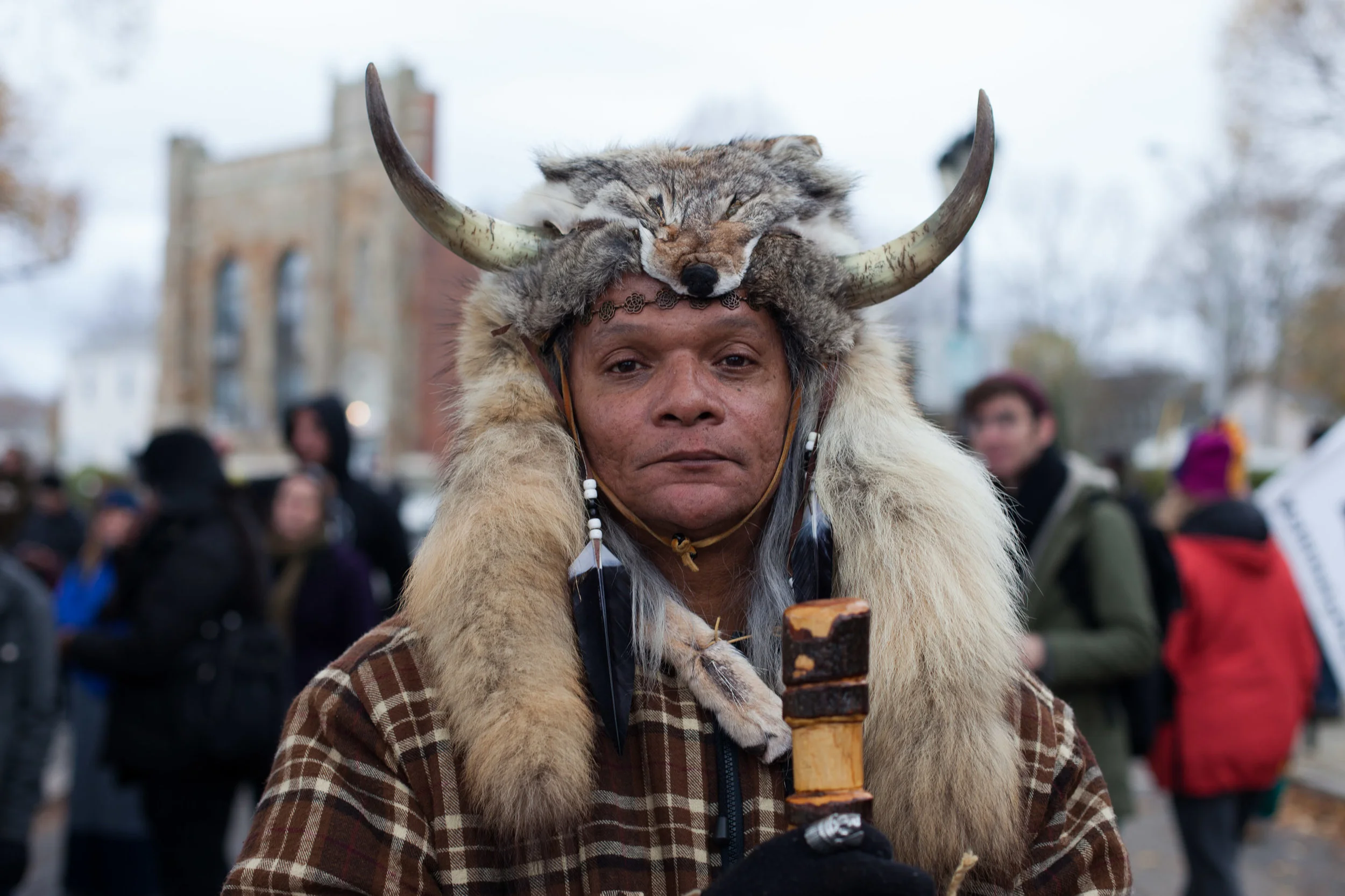 Who will protect those who protect the water? Nature Boy, a man of many nations, attended the Day of Mourning. “Have you been to the Indian burial ground? Want to know where it is? You are standing on it.” This past Thanksgiving, hundreds gathered in Plymouth, Massachusetts for the 47th National Day of Mourning, organized by the United American Indians of New England. This year’s rally focused on protesting the Dakota Access Pipeline and standing in solidarity with the water protectors in Standing Rock.