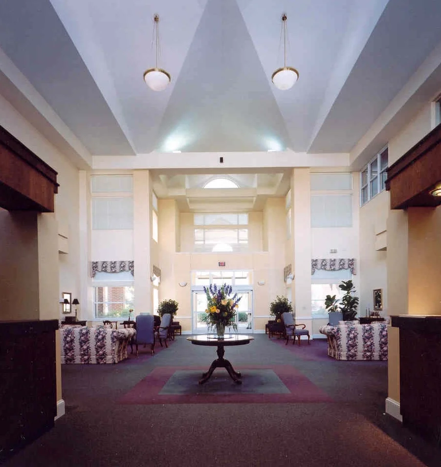 Providing several levels of adult care, from independent living in nearby cottage homes to specialized nursing care, Carolina Meadows has set the standard for the Triangle region’s senior living communities. Gurlitz Architectural master-planned this senior campus community including programming of the intended uses. Gurlitz Architectural designed the main community center, recreation and athletic facilities, the dining hall, and multi-story apartment homes. Gurlitz Architectural also designed the adjacent cottage homes, both detached single family and duplex style housing to serve the community’s independent living need.