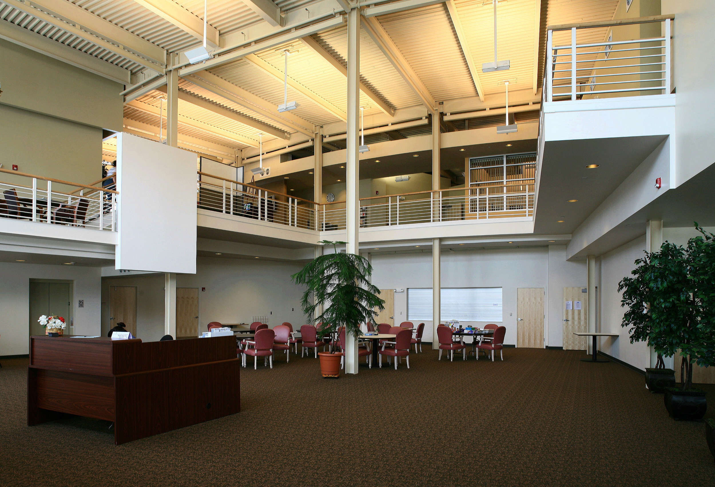 The Center for Senior Life has two primary functions: First it offers the recreational functions of an active senior community in Durham including: a theater, meeting facilities, large gathering spaces, classrooms, and offices for the Center administration as well as community service organizations. Second, the building has a 50-person Adult Day Care facility which was specially designed for persons suffering from various forms of cognitive dysfunction. The building also functions as a community meeting place located adjacent to the “Central Park” area of Durham. The building was designed with LEED principles although Durham County did not pursue full certification. The construction cost was in excess of $5,000,000.