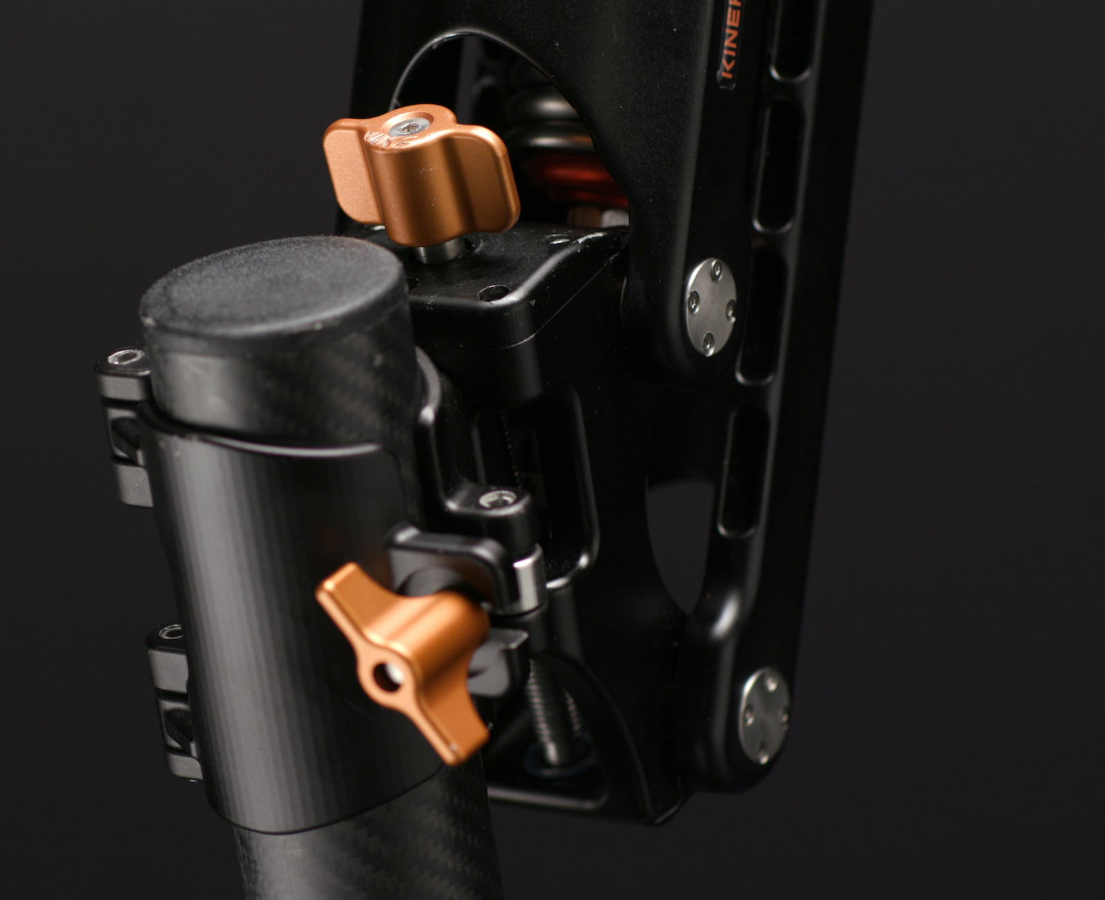 Main attachment clamp and adjustment block.