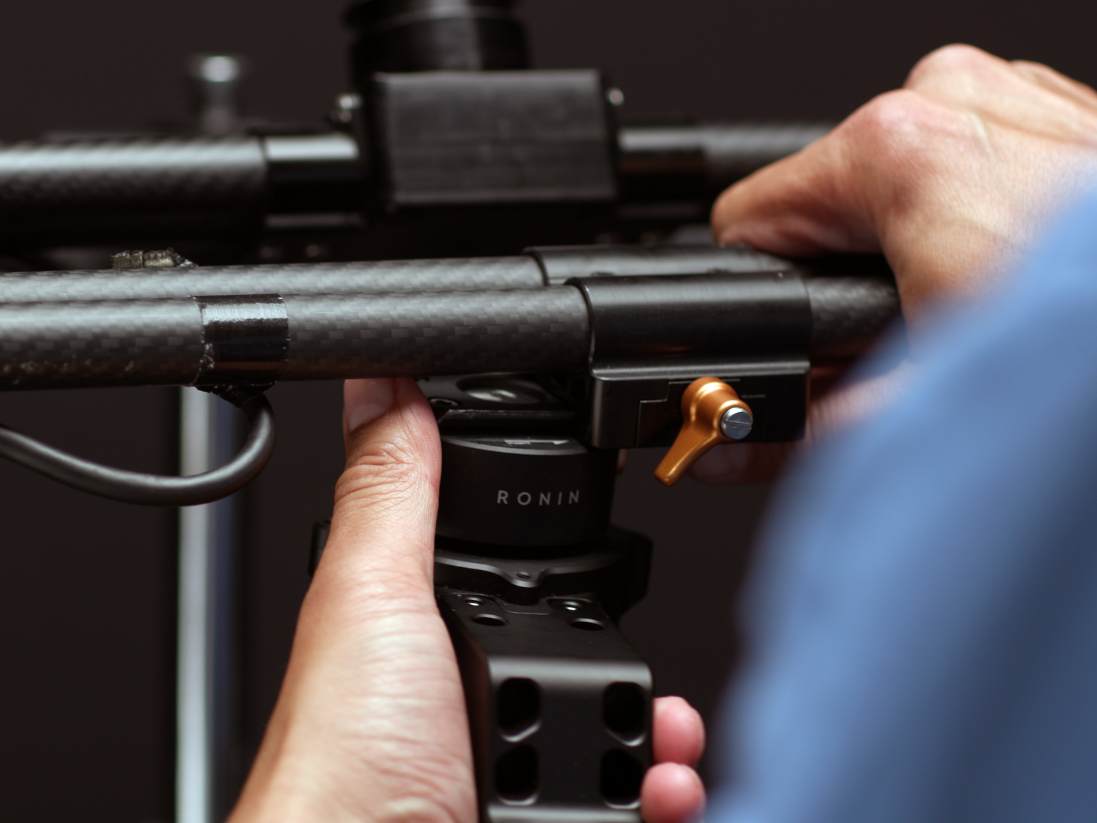 DJI Ronin being connected to the COG pan/tilt handles.