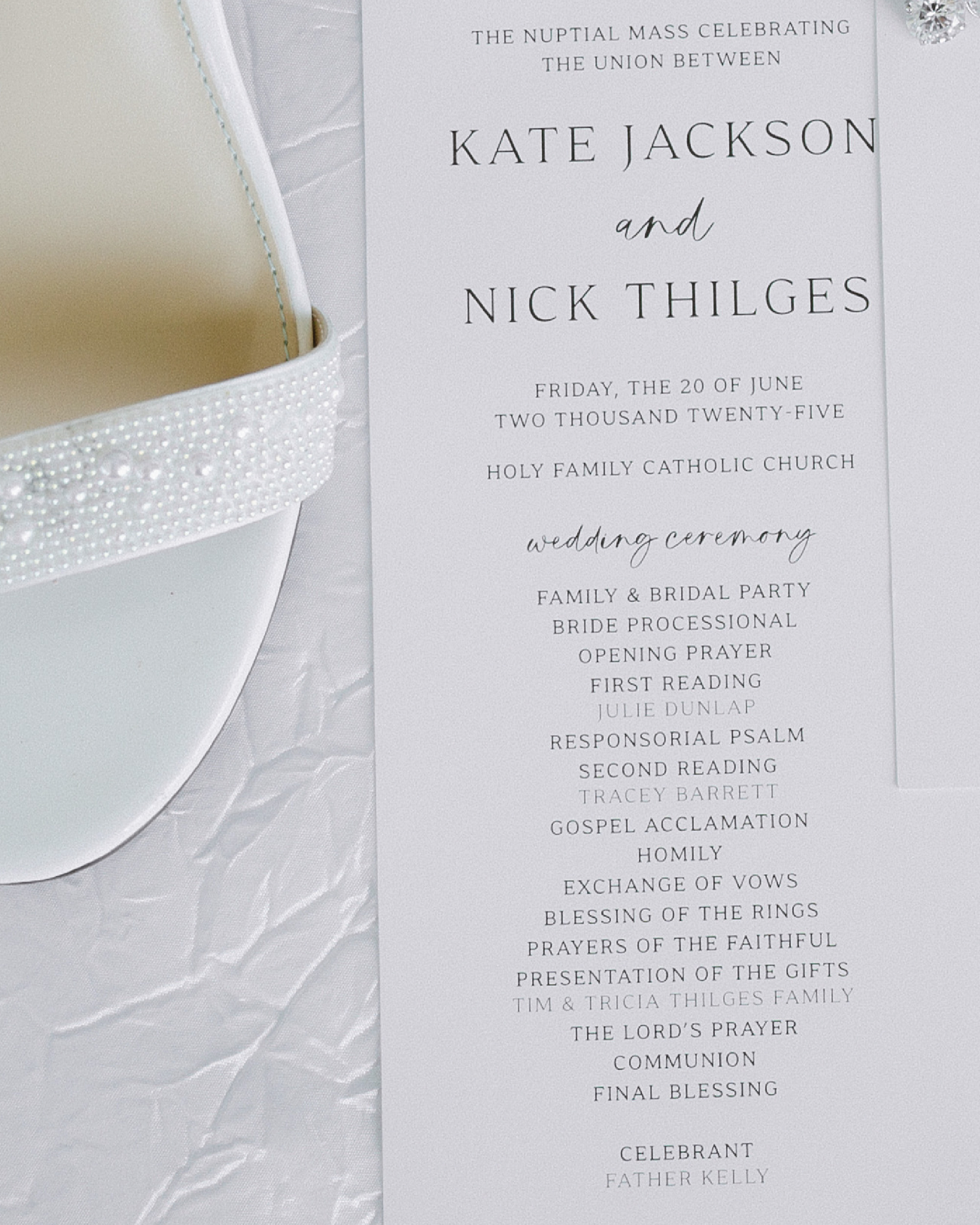 A wedding program for a nuptial mass featuring Kate Jackson and Nick Thilges, with details of the ceremony including various prayers, readings, and family events, placed on a white textured fabric background with decorative accents.