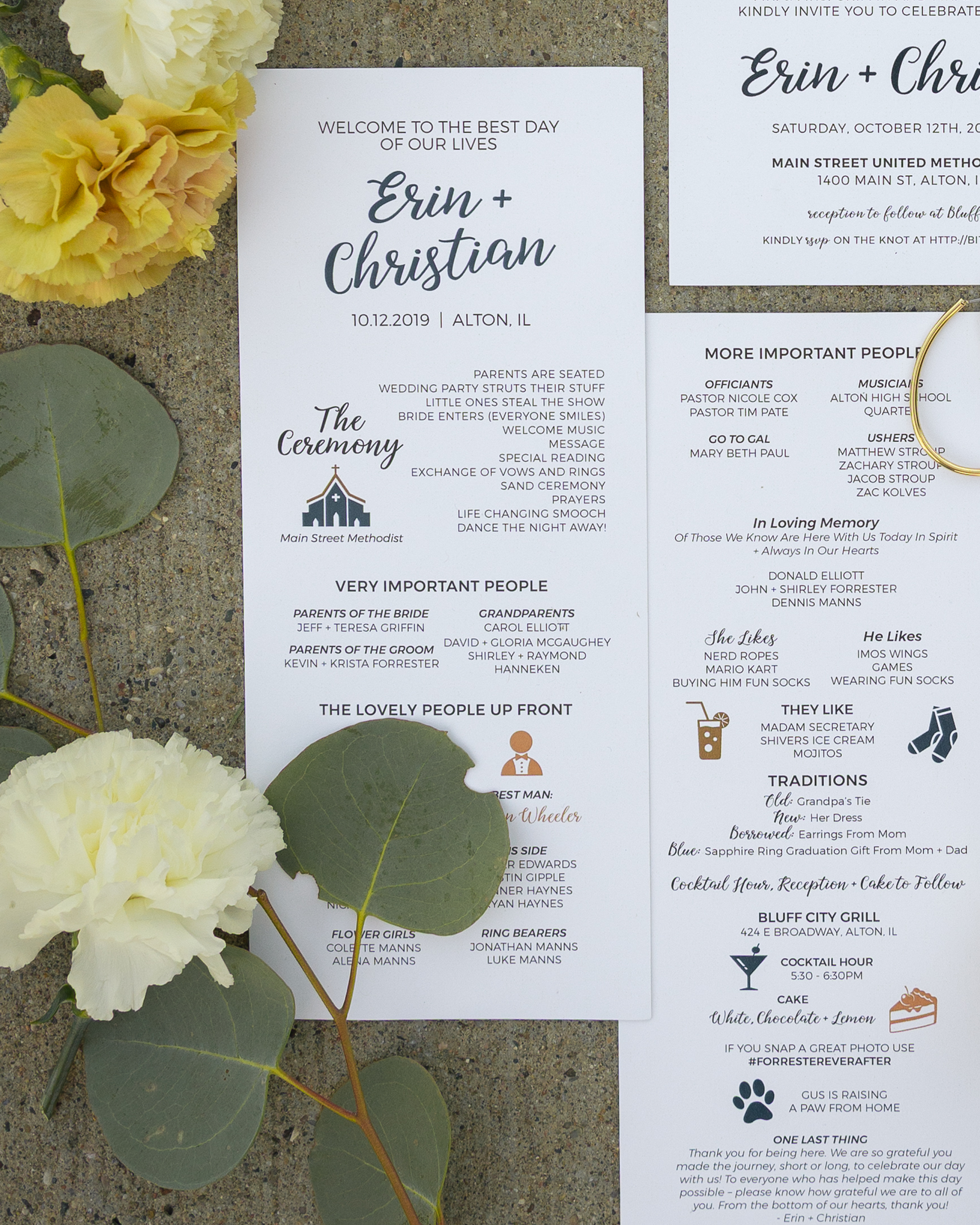 Wedding invitation for Erin and Christian, dated October 12, 2019, in Alton, Illinois, surrounded by yellow and white carnations and green leaves on a textured surface.