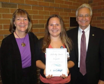 Marti Kuimjian, Bellin College recipient with Renee and Doug LaViolette