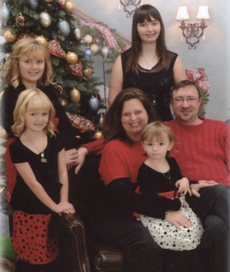 Frank’s son, Brian, his wife, Nicol and granddaughters Meredith, Kristina, Catherine, and Madelyn.