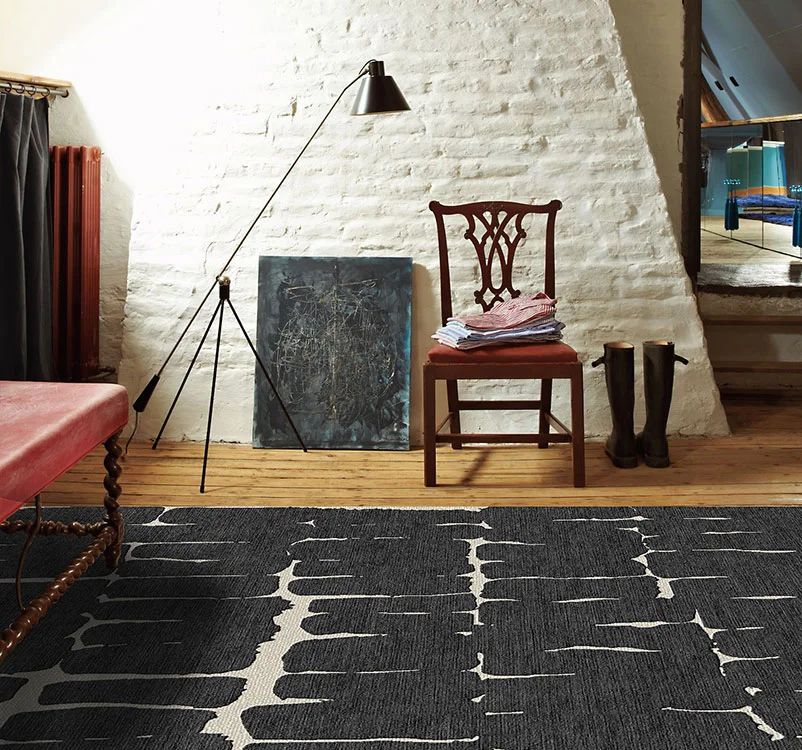 gray-rug-CORINA-black-white-room.jpg